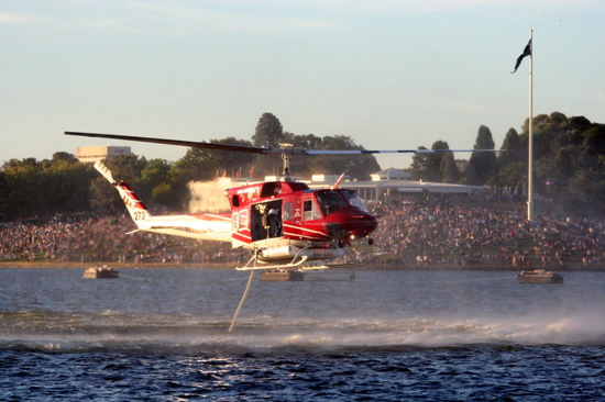 Firefighting chopper filling up in Lake Burley Griffin